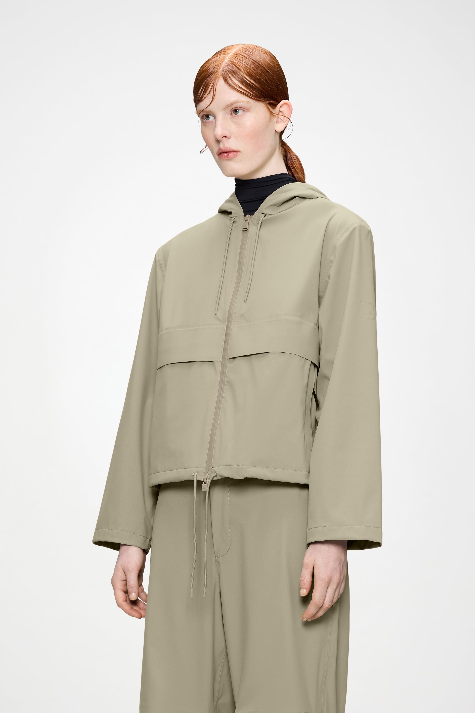 RAINS Suva Hardshell Short String W Jacket Beige Jacket
